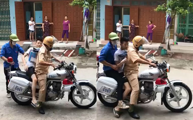 Hình ảnh nam sinh ngủ quên được CSGT phá cửa gọi dậy đi thi năm nào Hình ảnh nam sinh ngủ quên được CSGT phá cửa gọi dậy đi thi năm nào