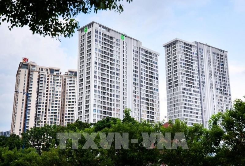 Các tòa cao ốc căn hộ chung cư ở Quận 4 (Thành phố Hồ Chí Minh). Ảnh: Hồng Đạt - TTXVN