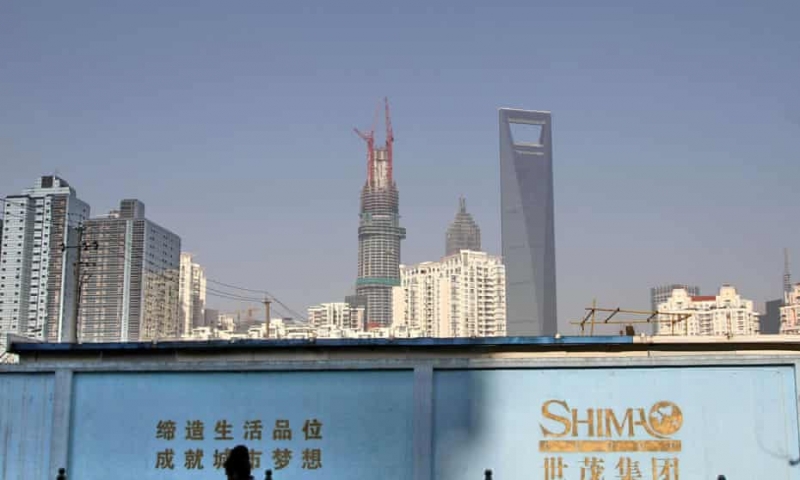 Khu xây dựng Shimao ở Thượng Hải. Công ty đang bán một số tài sản của mình sau khi vỡ nợ trong một khoản vay tín chấp vào tuần trước. Ảnh: China Stringer Network/Reuters